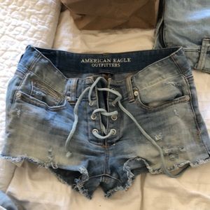 American eagle distressed lace up jean shorts